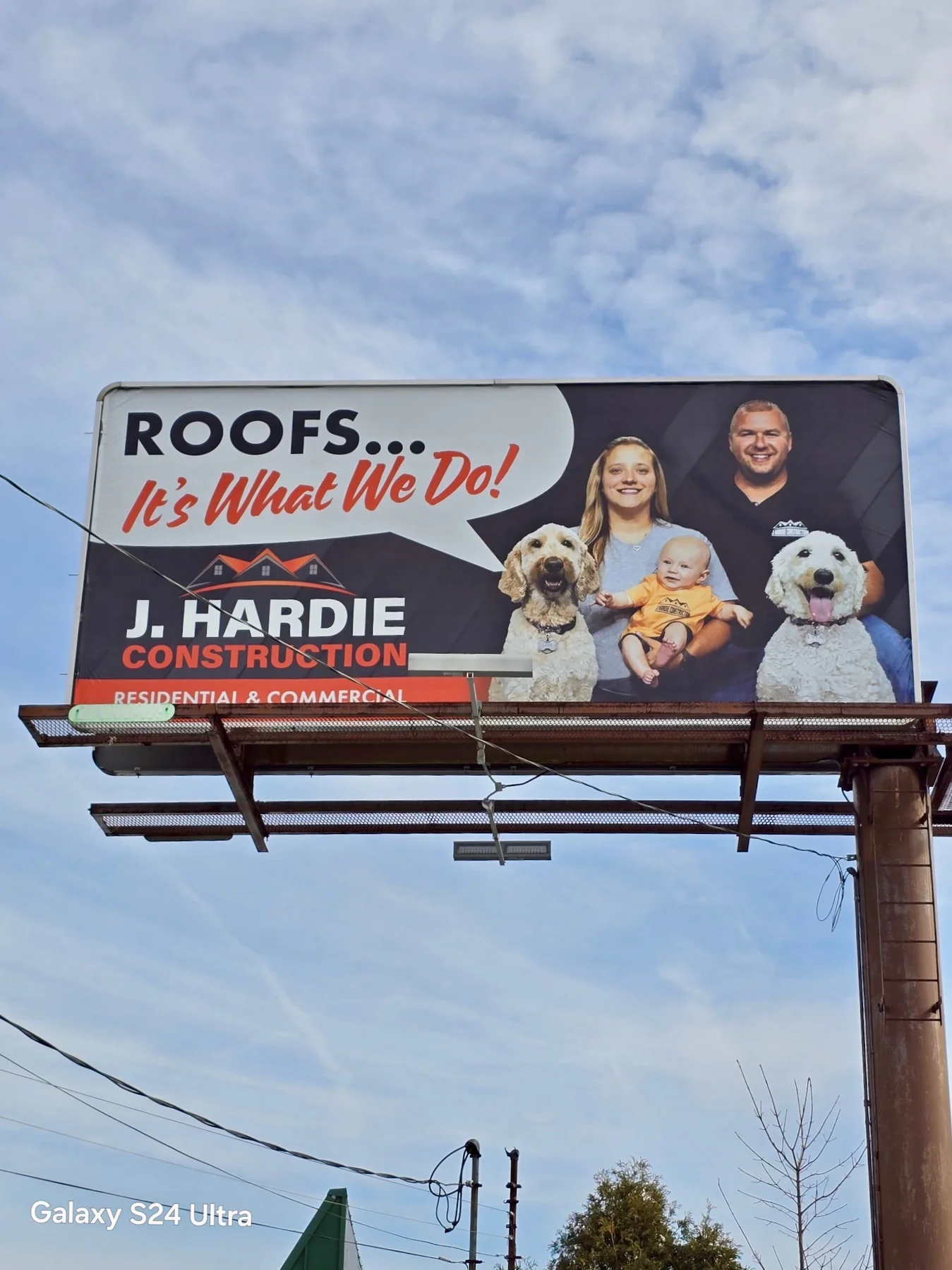 J Hardie Construction roofing billboard